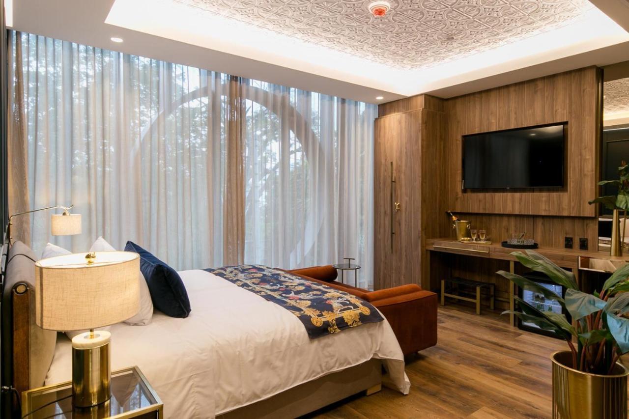 Hotel Marquee Medellín Dış mekan fotoğraf A bedroom at the hotel
